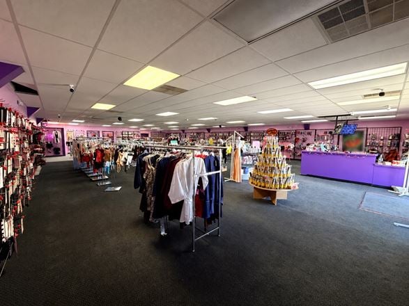 Retail Property with Open Showroom Near Hy-Vee For Sale