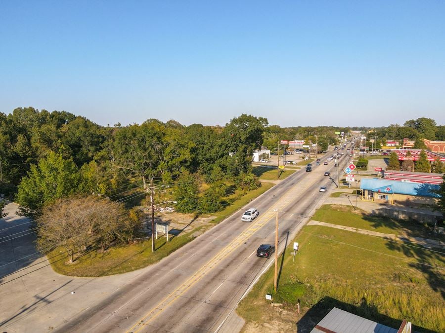 ±7 Acre Development Tract near Visible Signaled Intersection