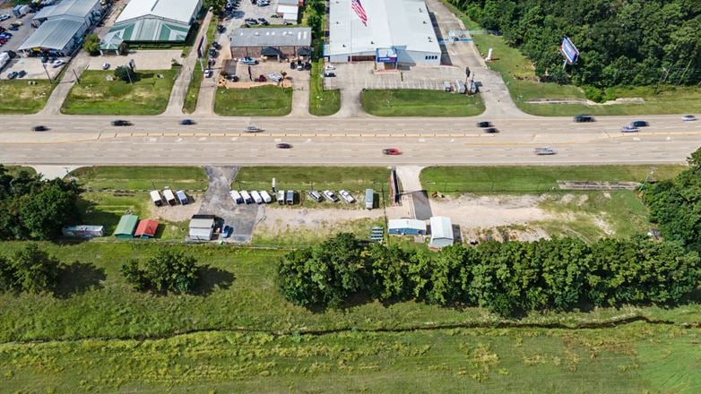 Commercial Investment & Redevelopment Opportunity | Approximately 600' of Highway 105 Frontage | Owner Financing Available