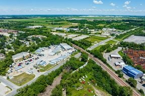 Industrial Facility with Office Space & Fleet Storage & 11.8± AC Dev. Site