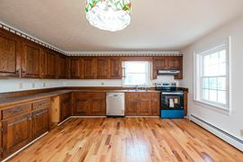 CHARMING BRICK HOME ON 13-ACRES WITH GUEST APARTMENT