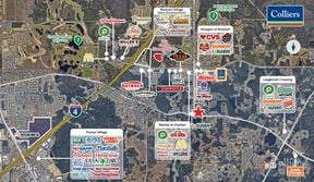 ±6.94 acres with ±908.29 feet of frontage on Ronald Reagan Parkway