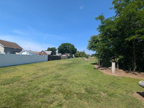 Versatile Industrial Property with Extra Lot – 21 Pommenville St, Pawtucket, RI  02861 & lot 927 Campbell St 