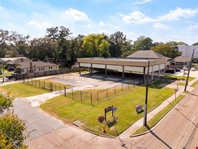 Parking Lot with Covered Area in Mid-City