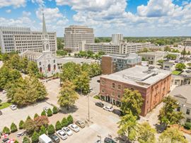 New Price: Gras Town Plaza - Office Building & Parking Lot in Downtown