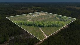 41+/- AC Residence, Farm, Timber + 1200 SF & 1800 SF storage buildings