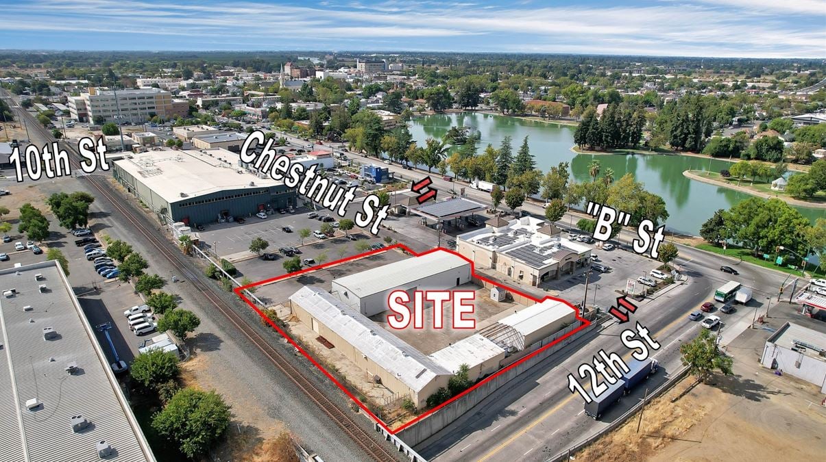 ±11,500 SF Of Clear Span Industrial Buildings + Fenced Lot