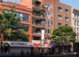 Prime Investment Opportunity: Fully Leased 10-Unit Building with Commercial Space