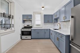 1528 E 74TH PL | 6 Unit Multifamily