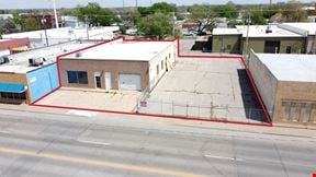 WAREHOUSE/SHOP WITH FENCED LOT