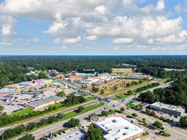 Retail Suites and Outparcel Available at The Crossing Shopping Center