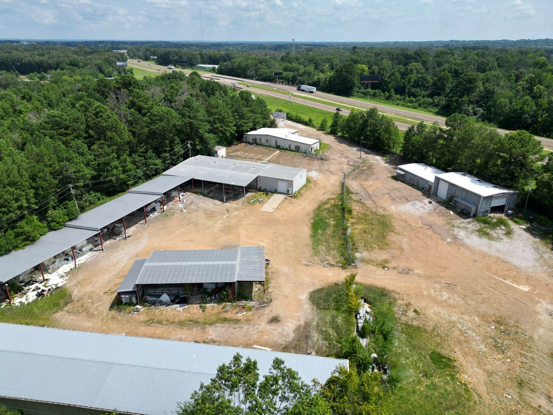 Industrial Facility on ±4.91 Acres - Interstate Frontage