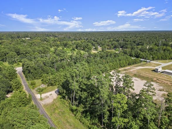 SELLER FINANCING - Prime 3.9 Acre Parcel in Conroe with Frontage – Unrestricted and Ready for Development