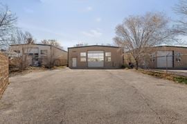 RARE WAREHOUSE WITH GATED & PAVED YARD