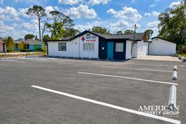 Freestanding Commercial Building with Fenced Land in Downtown Englewood