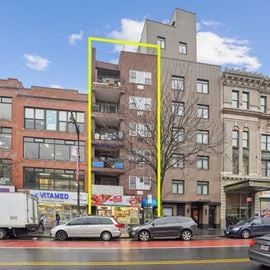 Prime Investment Opportunity: Fully Leased 10-Unit Building with Commercial Space