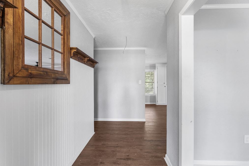 High-visibility location with endless potential! Commercial or Residential for Versatile Use