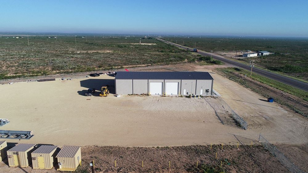 7,200 SF Shop on 6.8 Acres with US Hwy 285 Frontage!