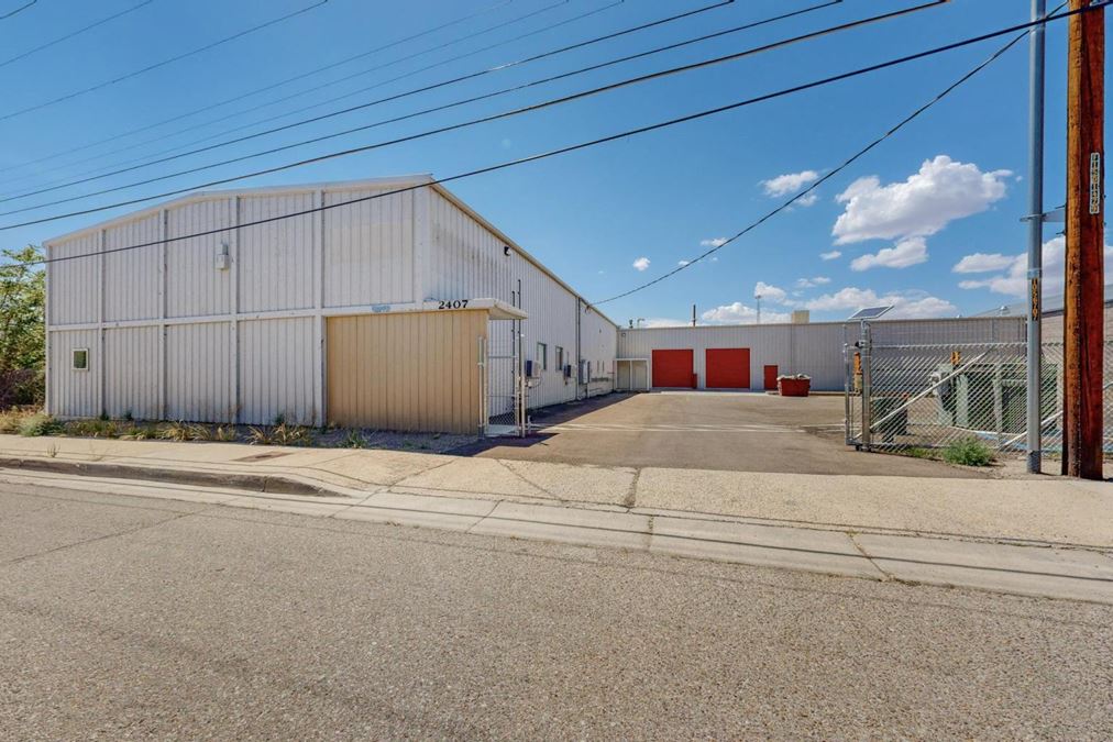 Newly Updated Clearspan Warehouse with Gated & Paved Yard near Big I