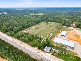 Expansive 23-Acre Tract on High-Traffic Hwy 105 – Prime Development Opportunity -  Seller Financing Available