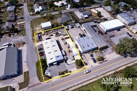 Corner Lot Industrial Property with Showroom, Office, and Yard
