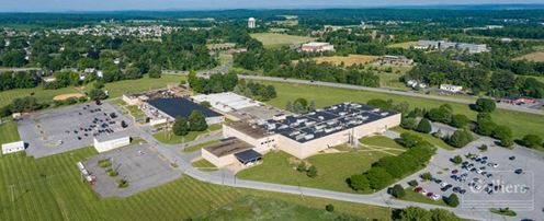 Single Tenant Facility with Multi-Tenant and Redevelopment Potential Near Penn State University