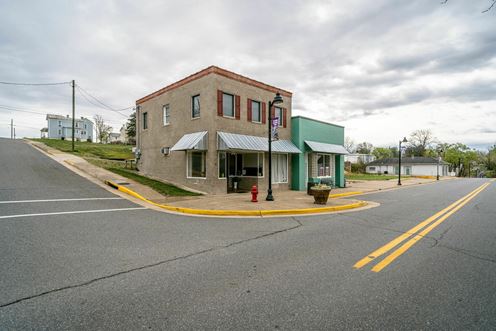 INVESTMENT OPPORTUNITY | OCCUPIED MIXED-USE BUILDINGS + 0.51 ACRES