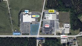±0.91-Acre Outparcel Opportunity in a Grocery Anchored Shopping Center