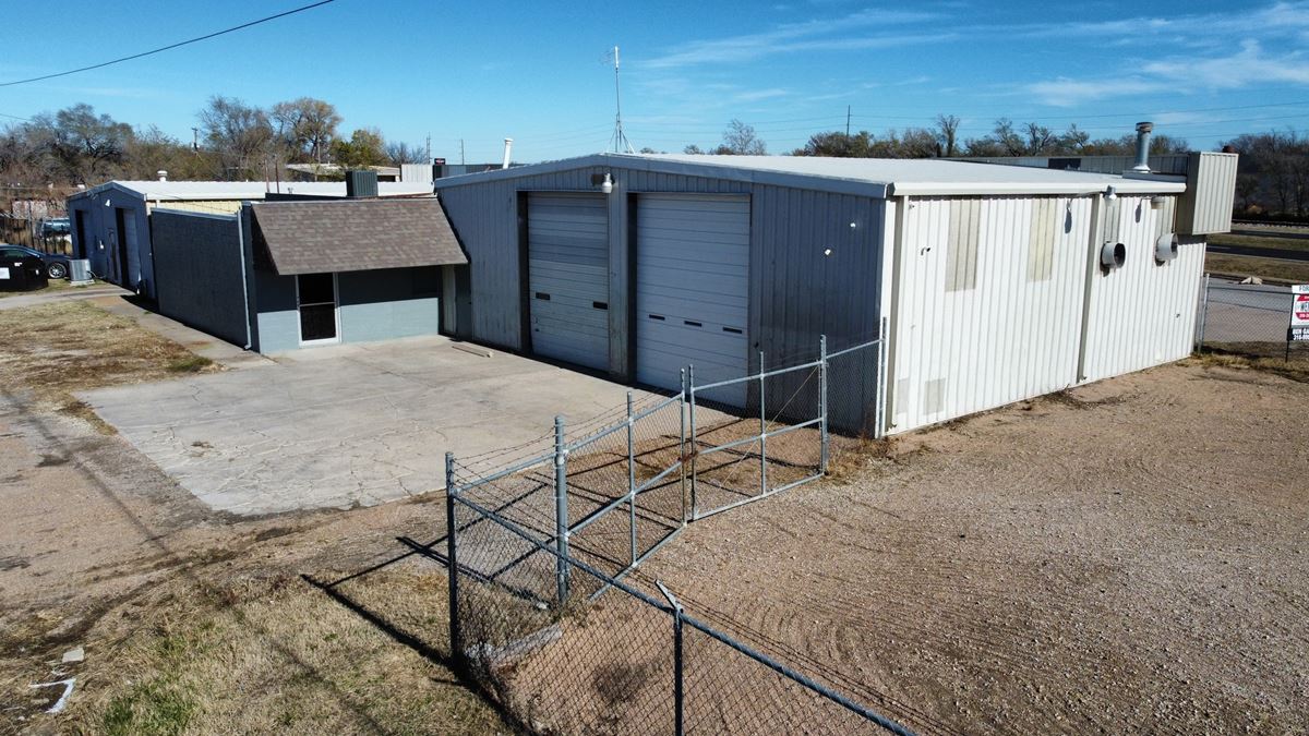 SHOP WITH FENCED YARD