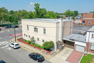 64-57 WOODHAVEN BOULEVARD