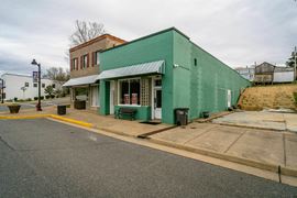 INVESTMENT OPPORTUNITY | OCCUPIED MIXED-USE BUILDINGS + 0.51 ACRES