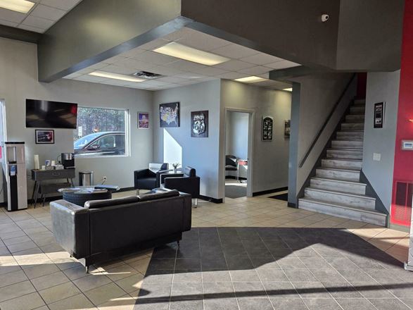 5967 Robinson Rd. - 80-vehicle paved & lighted parking lot with 1,000+/- SF of office/showroom space