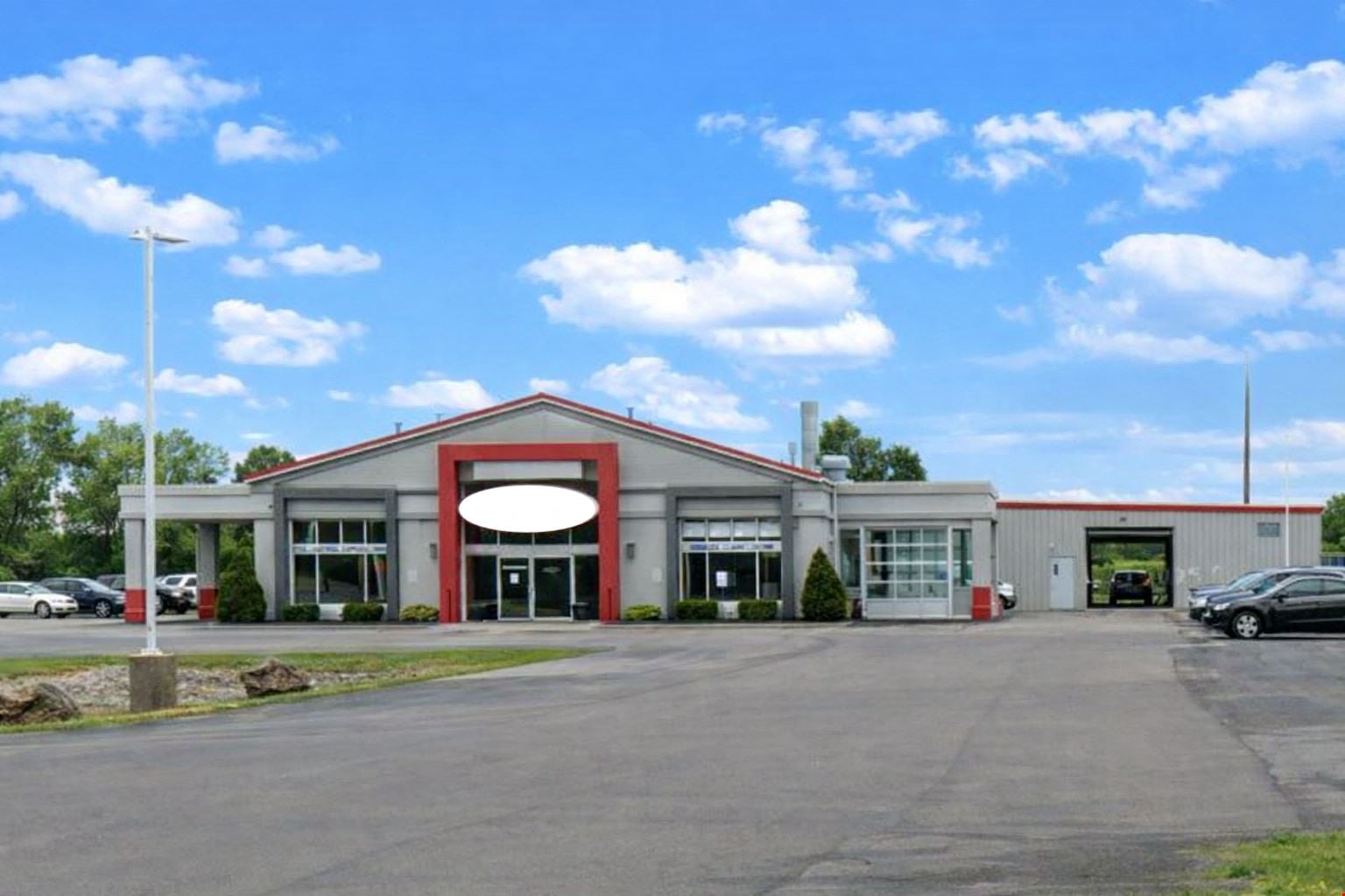 5967 Robinson Rd. - 80-vehicle paved & lighted parking lot with 1,000+/- SF of office/showroom space